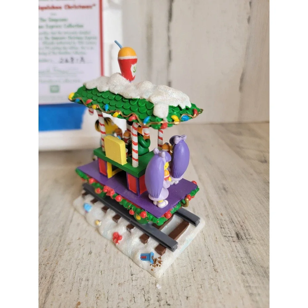 Hamilton Simpsons have a squishee Christmas kwik‎ e mart train apu Xmas vintage